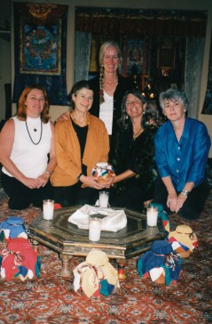 women with vase in kiva