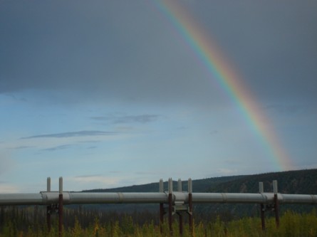 This is the rainbow that appeared after the burial of the Earth Treasure vase and in the foreground is the trans-atlantic pipeline that carries the oil that is mined in this region