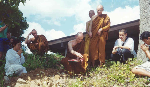 The Ceremony ended as monks and people from the community burried the Earth Treasure Vase on a vista in Dtao Dum Forest